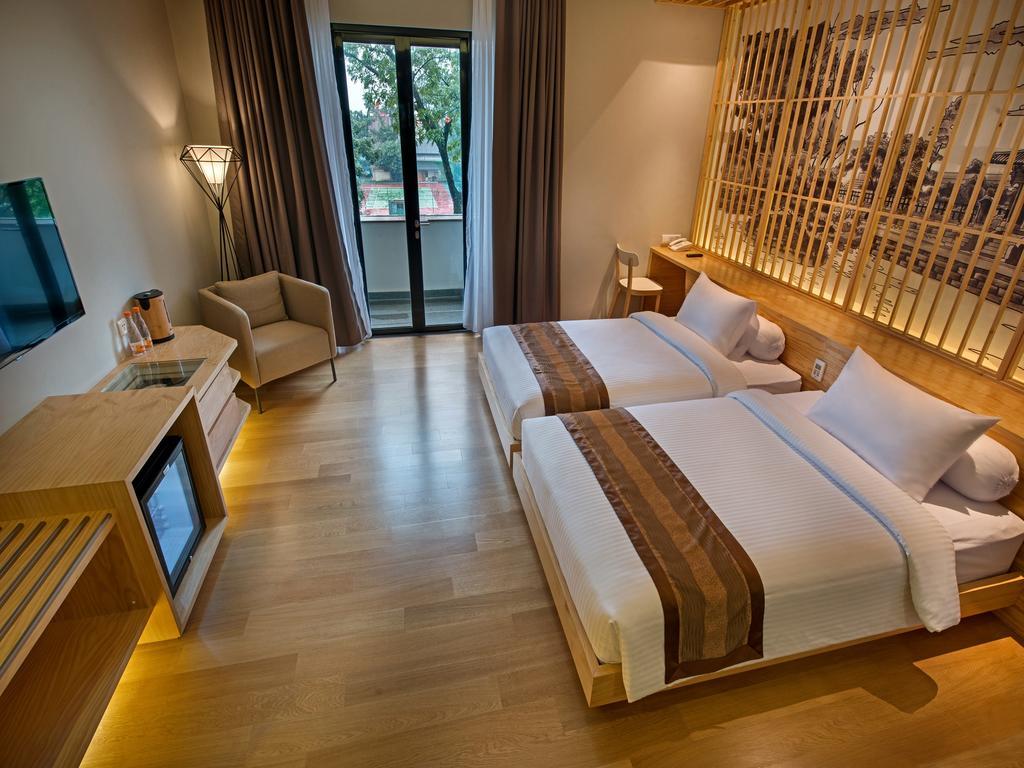 Tama Boutique Hotel Bandung Extérieur photo
